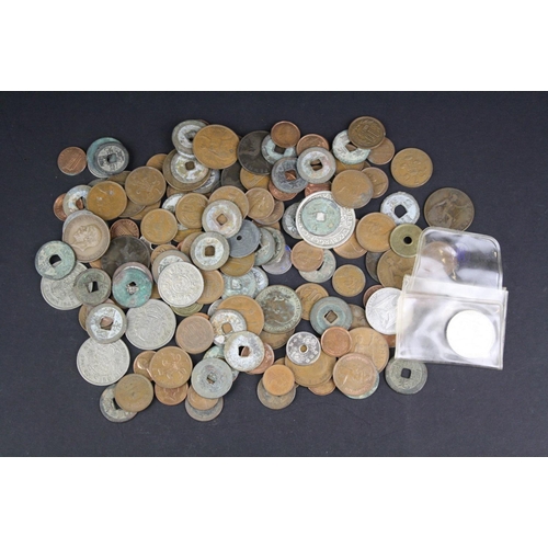 91 - A small collection of mixed coins to include British pre decimal and foreign examples to including a... 