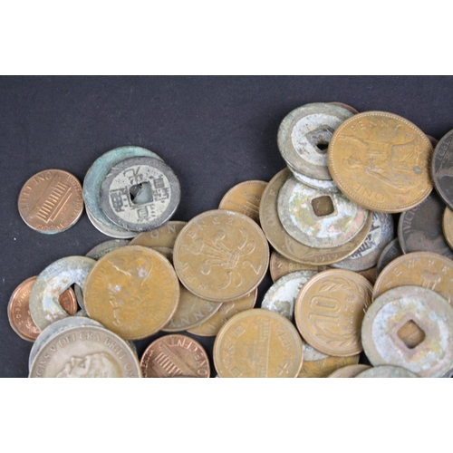 91 - A small collection of mixed coins to include British pre decimal and foreign examples to including a... 