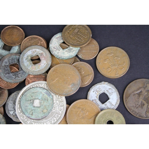 91 - A small collection of mixed coins to include British pre decimal and foreign examples to including a... 