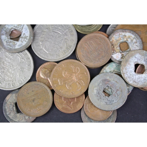 91 - A small collection of mixed coins to include British pre decimal and foreign examples to including a... 