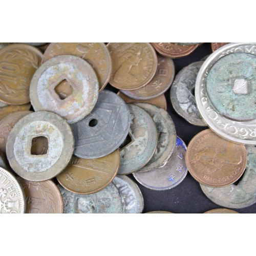 91 - A small collection of mixed coins to include British pre decimal and foreign examples to including a... 