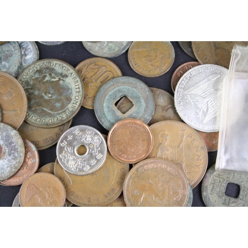 91 - A small collection of mixed coins to include British pre decimal and foreign examples to including a... 