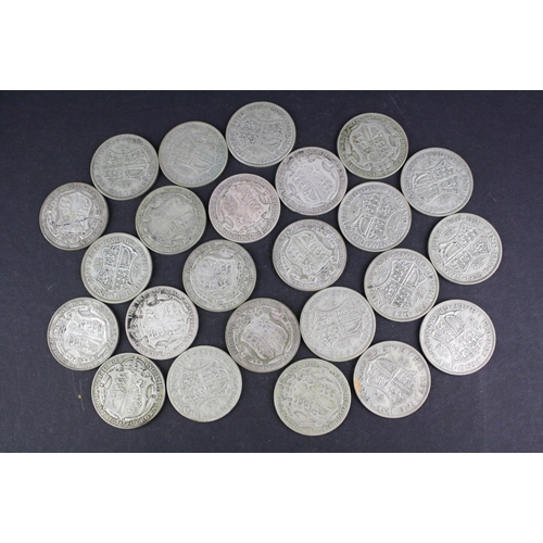 93 - A collection of approx twenty four King George V silver half crown coins.