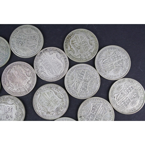 93 - A collection of approx twenty four King George V silver half crown coins.