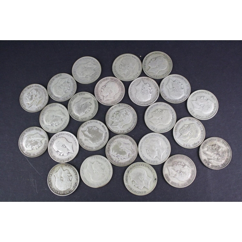 93 - A collection of approx twenty four King George V silver half crown coins.