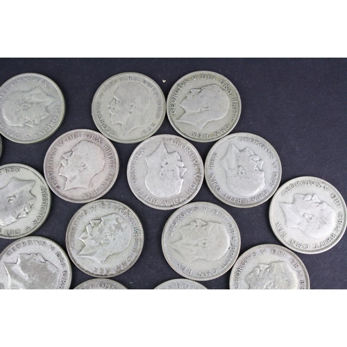 93 - A collection of approx twenty four King George V silver half crown coins.