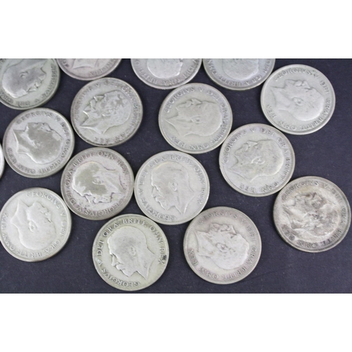 93 - A collection of approx twenty four King George V silver half crown coins.