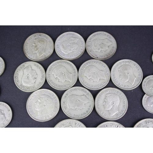 94 - A collection of British pre decimal King George VI coins to include half crowns, shillings, sixpence... 