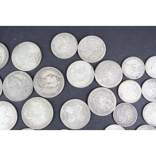 95 - A collection of British pre decimal Queen Victoria and King Edward VII silver coins to include Shill... 