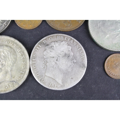 96 - A small collection of British pre decimal and commemorative coins to include Queen Victoria and King... 