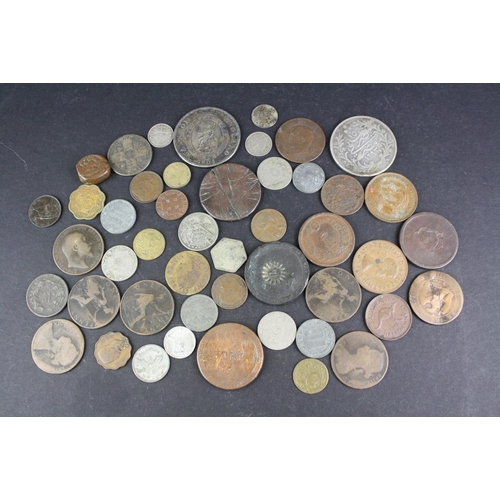 97 - A small collection of British pre decimal and foreign coins to include silver examples.