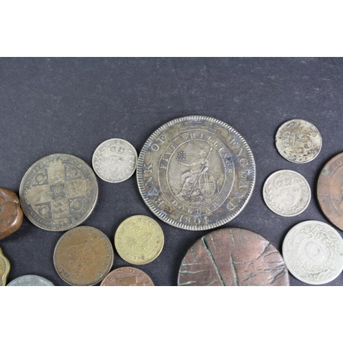 97 - A small collection of British pre decimal and foreign coins to include silver examples.