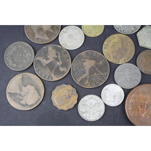 97 - A small collection of British pre decimal and foreign coins to include silver examples.