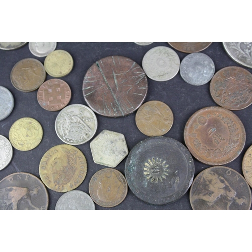 97 - A small collection of British pre decimal and foreign coins to include silver examples.