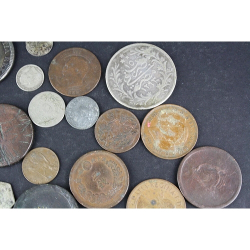 97 - A small collection of British pre decimal and foreign coins to include silver examples.