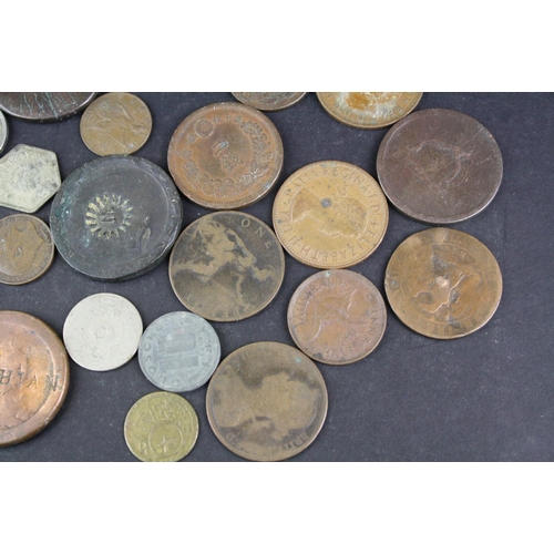 97 - A small collection of British pre decimal and foreign coins to include silver examples.