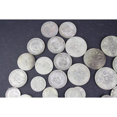 98 - A collection of British pre decimal King George V silver coins to include Florins, Shillings, sixpen... 