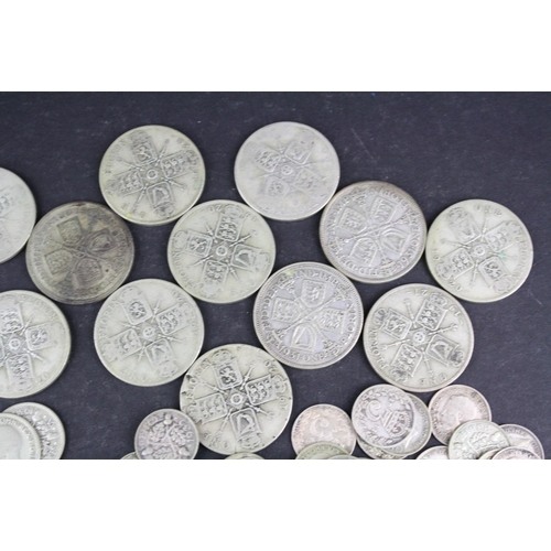 98 - A collection of British pre decimal King George V silver coins to include Florins, Shillings, sixpen... 