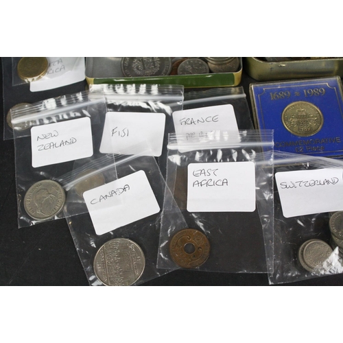 136 - A small collection of British decimal and pre decimal coins together with a small quantity of foreig... 