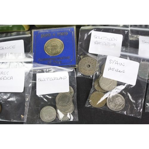 136 - A small collection of British decimal and pre decimal coins together with a small quantity of foreig... 