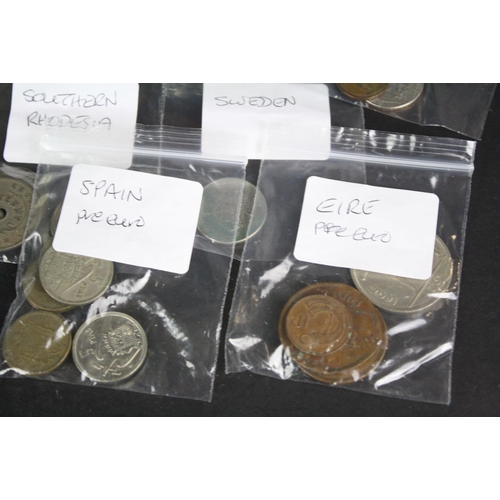 136 - A small collection of British decimal and pre decimal coins together with a small quantity of foreig... 