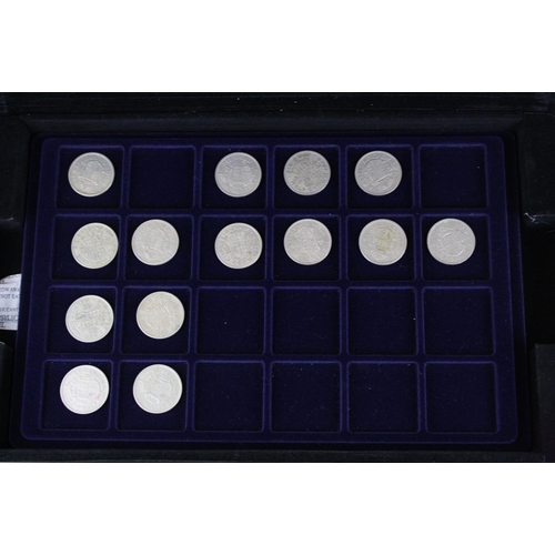 176 - A collection of British pre decimal coins contained within an aluminium collectors case to include s... 