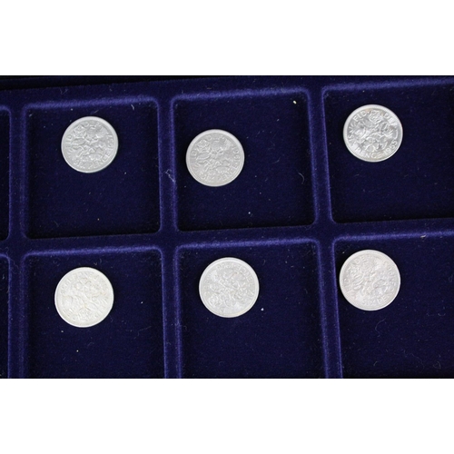 176 - A collection of British pre decimal coins contained within an aluminium collectors case to include s... 