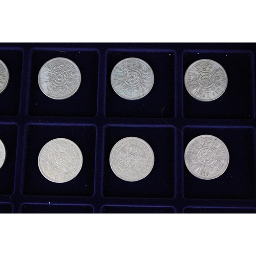 176 - A collection of British pre decimal coins contained within an aluminium collectors case to include s... 