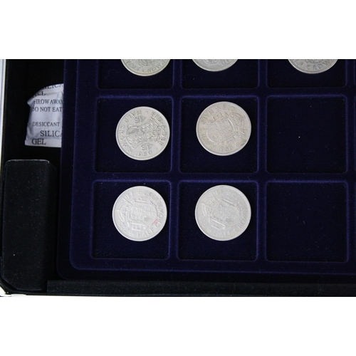 176 - A collection of British pre decimal coins contained within an aluminium collectors case to include s... 