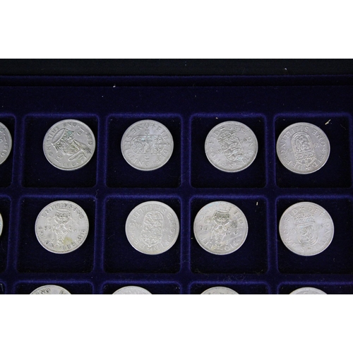 176 - A collection of British pre decimal coins contained within an aluminium collectors case to include s... 