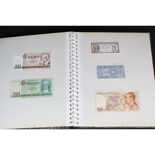 184 - A large collection of British and foreign banknotes to include a British £1 banknote consecutive not... 