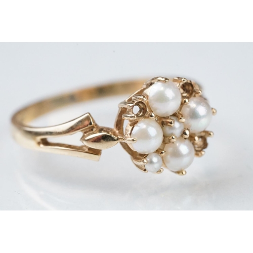 107 - Three 9ct yellow gold dress rings, comprising a diamond three tier cluster ring, ring size P½; a pea... 