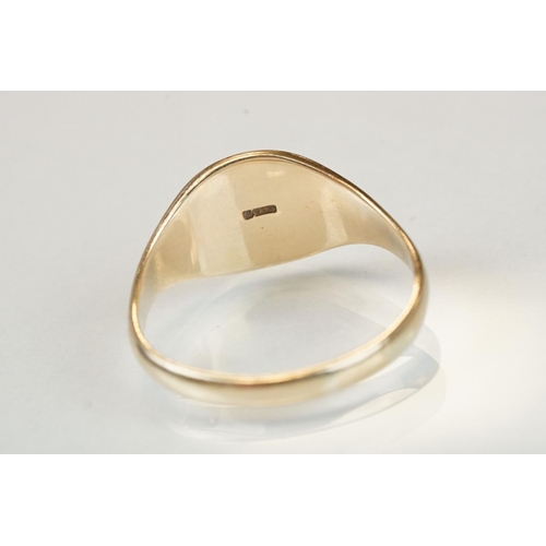 108 - 9ct yellow gold signet ring, rubbed engraving to the head, dimensions of head approx 11mm x 10.5mm, ... 