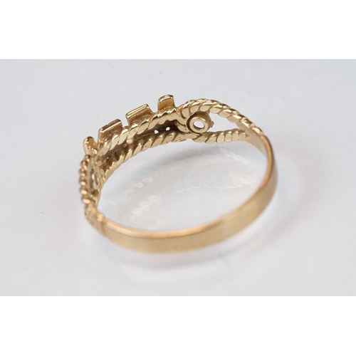 109 - Three 9ct yellow gold dress rings; to include 'mum' 9ct gold ring, size T; 9ct yellow and white gold... 