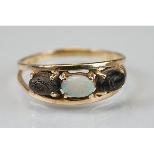 111 - Opal gem set 14ct yellow gold ring, size R½; a 9ct gem set yellow metal ring, size O, and a yellow m... 