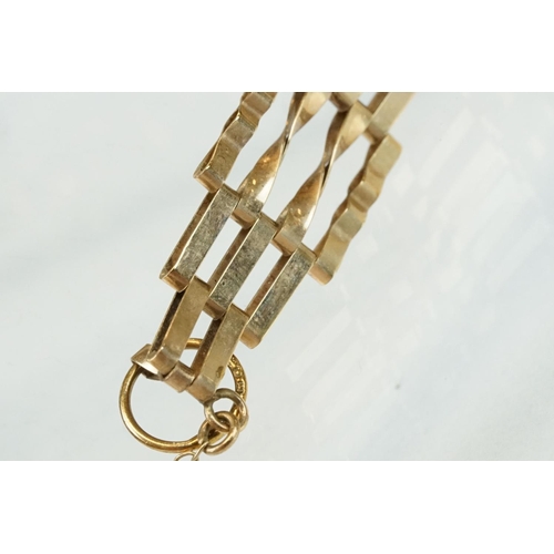 309 - 9ct gold gate link bracelet, padlock clasp, width approx 8.5mm