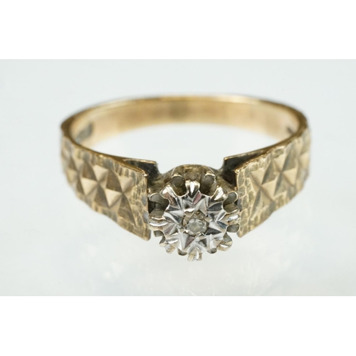 314 - Diamond 9ct yellow gold dress ring, size L½; together with a garnet and white stone 9ct yellow gold ... 