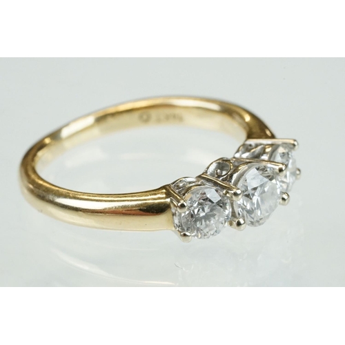 315 - Diamond 14ct yellow and white gold set three stone ring, three graduated round brilliant cut diamond... 