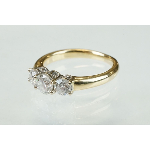 315 - Diamond 14ct yellow and white gold set three stone ring, three graduated round brilliant cut diamond... 