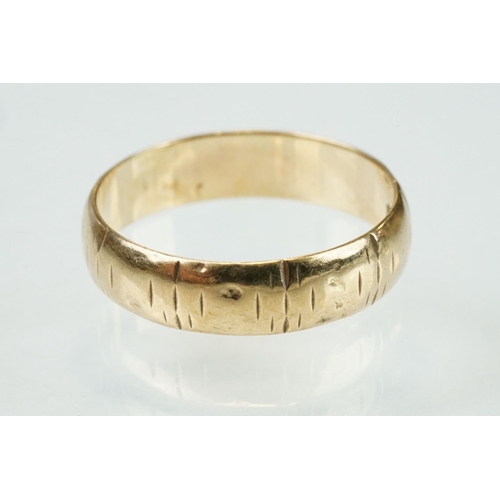 319 - 18ct yellow gold wedding band, width approx 3.5mm, band resized, ring size O; together with a 9ct ye... 