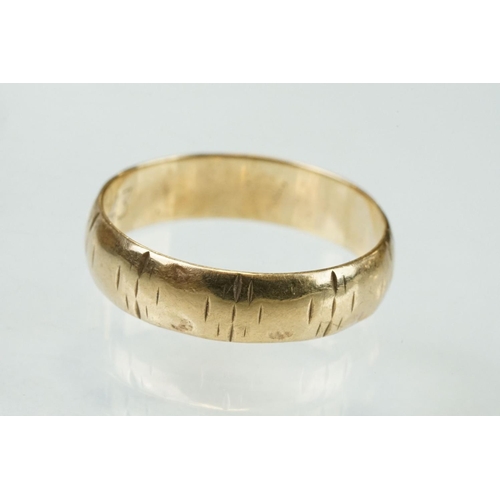 319 - 18ct yellow gold wedding band, width approx 3.5mm, band resized, ring size O; together with a 9ct ye... 