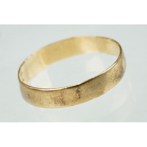 319 - 18ct yellow gold wedding band, width approx 3.5mm, band resized, ring size O; together with a 9ct ye... 