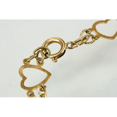 334 - 9ct yellow gold heart shaped panel bracelet, alternate openwork hearts with textured hearts, bolt ri... 