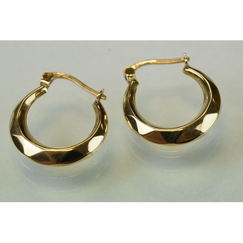 340 - Glass 9ct yellow gold dress ring, size K; together with a pair of 9ct yellow gold hoop earrings, ome... 