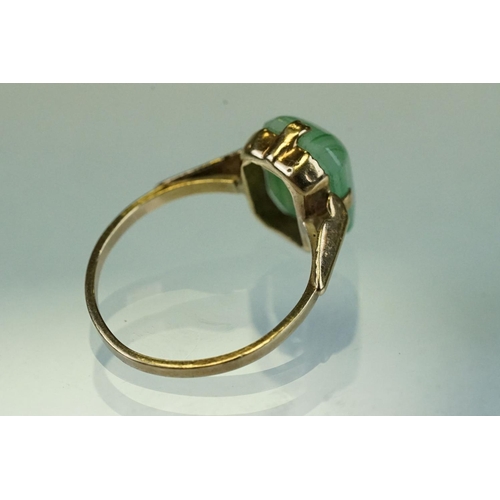 340 - Glass 9ct yellow gold dress ring, size K; together with a pair of 9ct yellow gold hoop earrings, ome... 