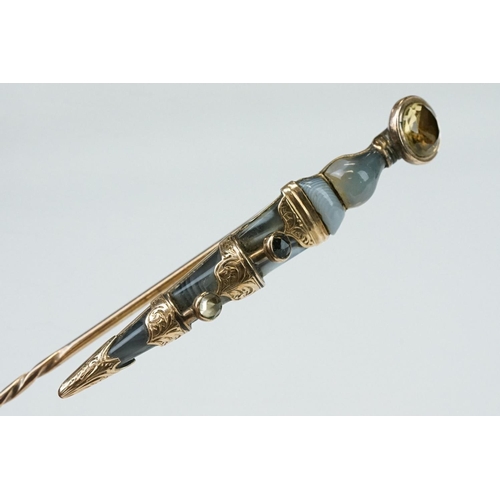 349 - Late 19th century gemstone unmarked rose gold stick pin modelled as a dirk set with blue lace agate,... 