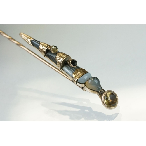 349 - Late 19th century gemstone unmarked rose gold stick pin modelled as a dirk set with blue lace agate,... 