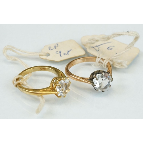 354 - Two paste set rings stamped 9ct together with eleven paste set yellow metal rings (13)