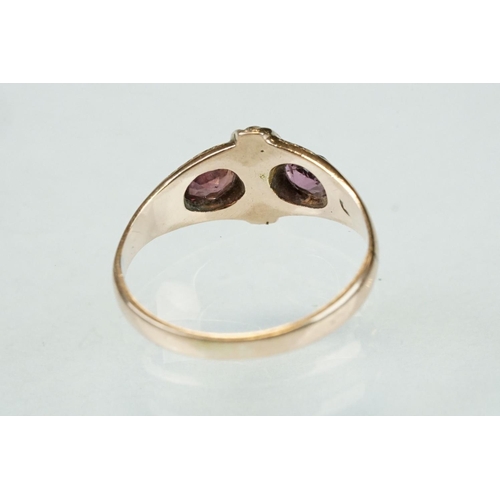 359 - 19th century garnet and pearl 9ct rose gold ring, two oval mixed cut garnets measuring approx 4.5mm ... 