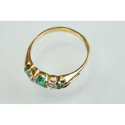 42 - 19th century emerald and diamond unmarked yellow gold ring, possibly stamped 18ct, three graduated e... 